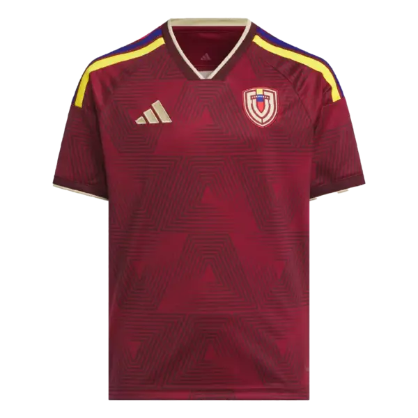 Nueva equipación de la selección venezolana para la Copa del Mundo 2026 con diseño geométrico en color vinotinto.