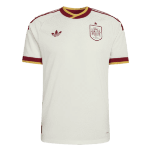 Camiseta de la selección de España para el Mundial 2026 - Equipación visitante blanca con detalles en granate y dorado.