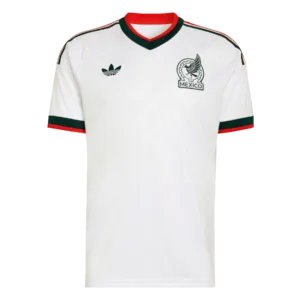 Camiseta de la selección de México para el Mundial 2026 - Equipación de visitante blanca con patrones prehispánicos en gris y verde.