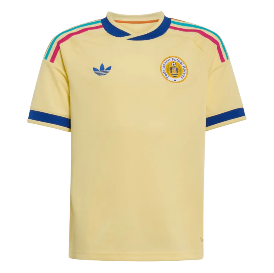 Camiseta de la selección de Curazao para el Mundial 2026 - Equipación visitante amarilla con detalles en azul y rosa.