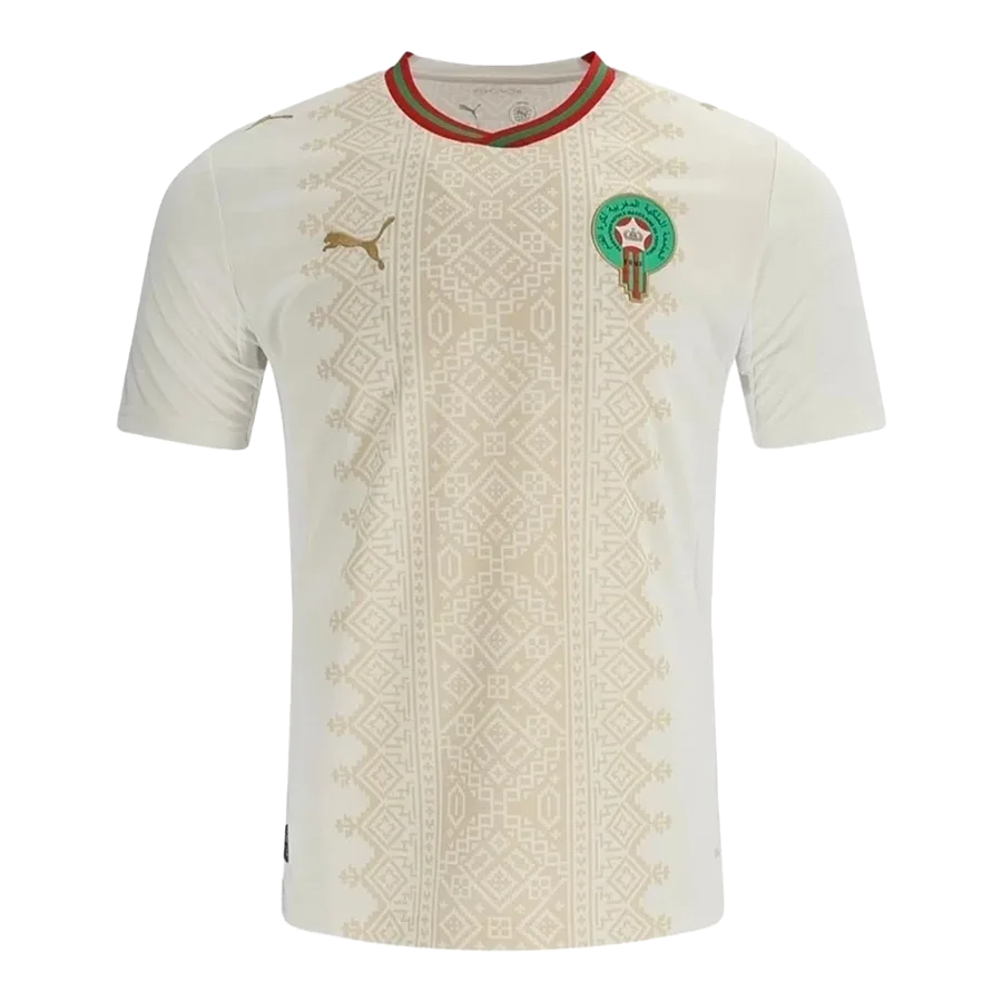 Camiseta de la selección de Marruecos para el Mundial 2026 - Equipación visitante blanca con intrincado patrón de arte tradicional.
