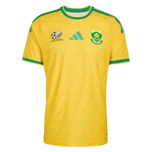 Camiseta de la selección de Sudáfrica para el Mundial 2026 - Equipación local amarilla con detalles verdes.
