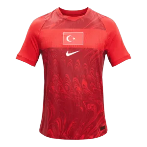 Camiseta de la selección de Turquía para el Mundial 2026 - Equipación visitante roja con patrones de ondas tonales.