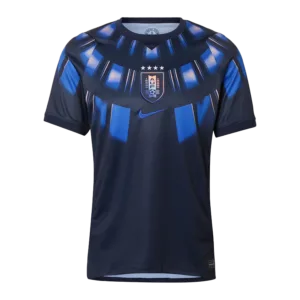 Camiseta de la selección de Uruguay para el Mundial 2026 - Equipación visitante azul marino con patrón de rayos solares.