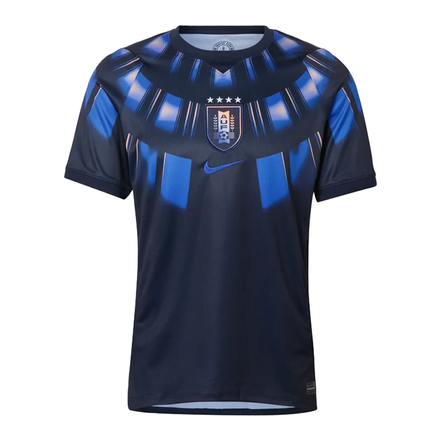 Camiseta de la selección de Uruguay para el Mundial 2026 - Equipación visitante azul marino con patrón de rayos solares.